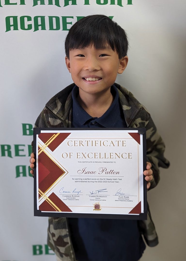 Child showing his diploma